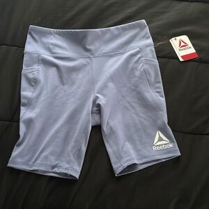 “Reebok Girls Compression Bike Shorts with Pockets” Size is XL (14/16)